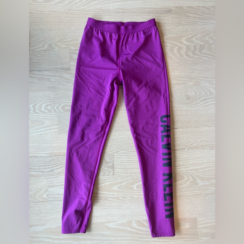 Calvin Klein workout leggings. Dark pink/ purple. Women size S. Never worn.